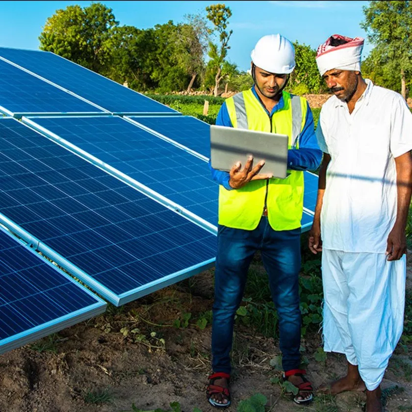 Altura engineer reviewing plant data with a landowner on site